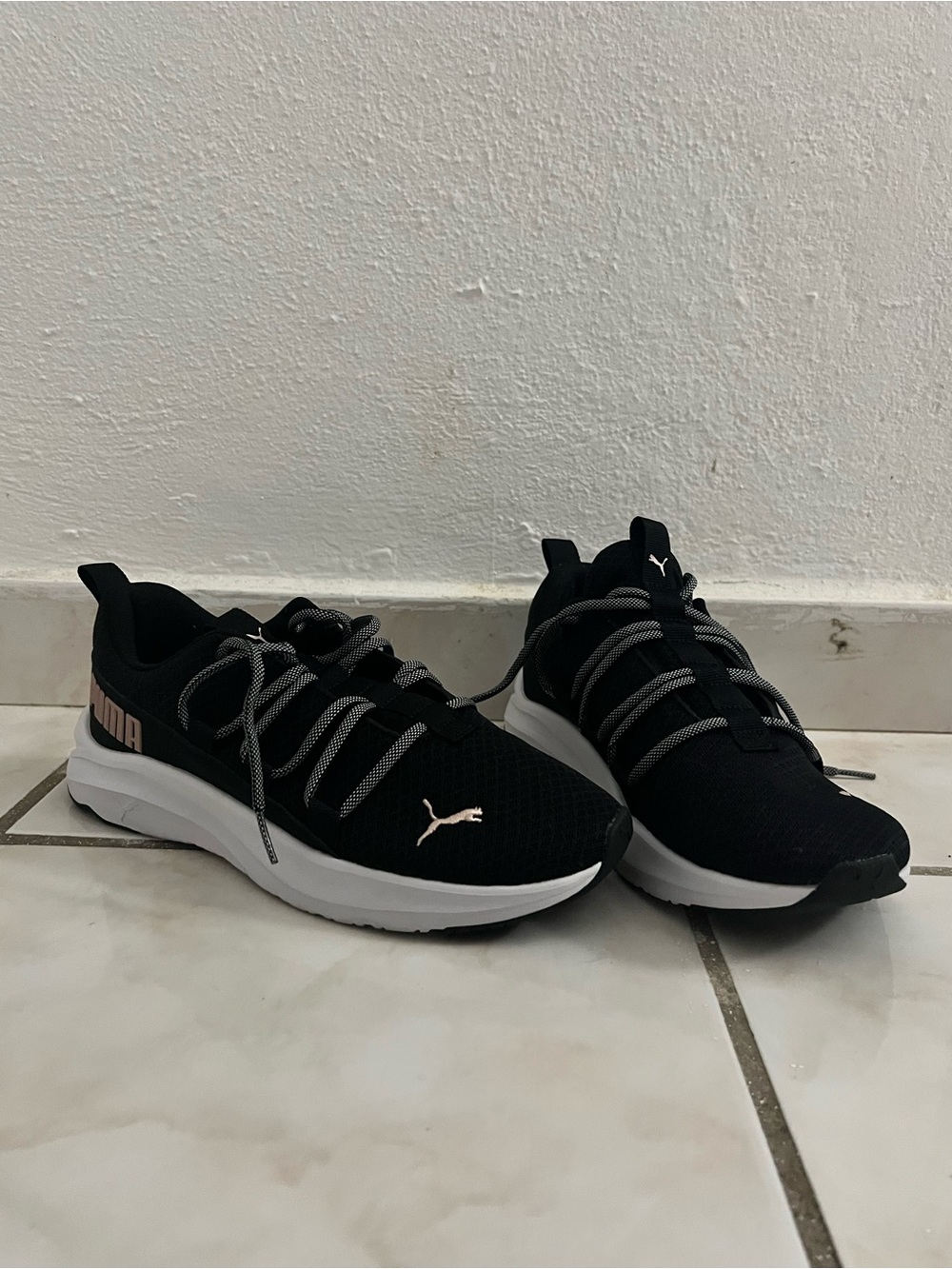 Puma Black and White Women's Athletic Sneakers with Rose Gold Accents